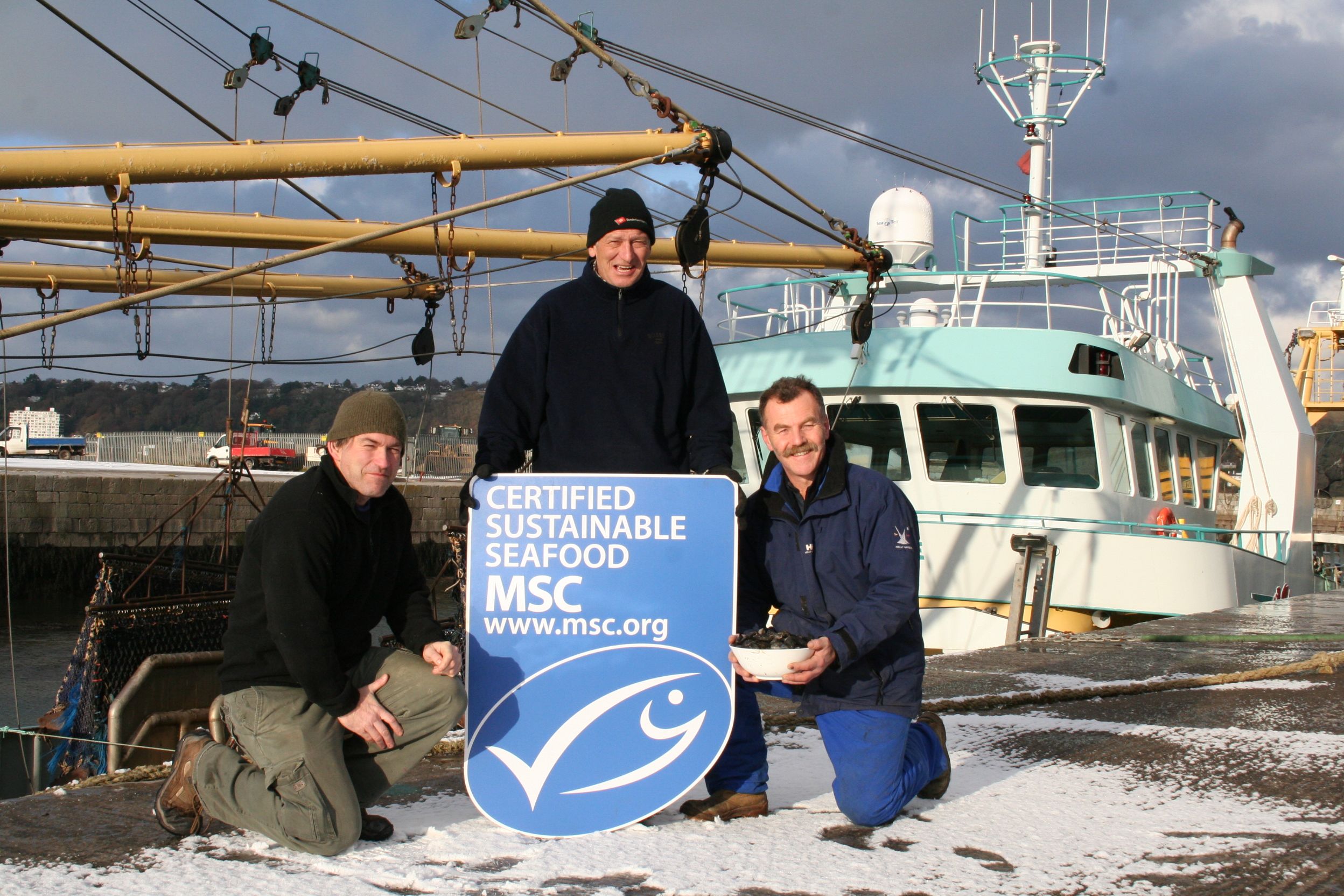 Fishermen with MSC Sign Fishermen with MSC Sign